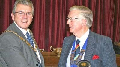 Cllr James Dudley, Chairman of Wyre Forest District Council and himself an old boy of the School, drew the raffle and presented a bottle of Glenmorangie to the winner, one of our guests, Maurice Evans, Old Foleyans Association President.