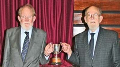 Some of the School's old trophies were on display, and, here, Bob and John Spilsbury hold the Junior 'Victor Ludorum' Cup, which Bob won in 1948 and John in 1942, making them the only pair of brothers at the School to win that particular award.