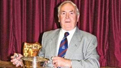 Norman Peacock holds the Rose Bowl for Cricket, which is presumably the first time he has touched it since he won it nearly fifty years ago!