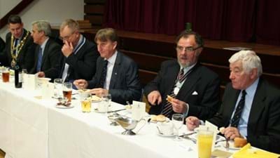 The top table guests show how it's done.