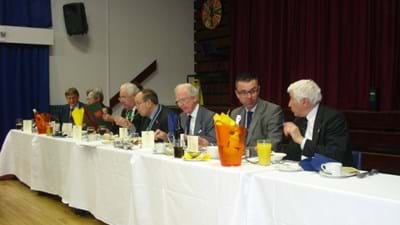 The top table guests surrounded by many colours.