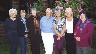 Some of the ladies standing in front of one of the plants that lends its name to the venue.