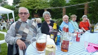 The Wilsons and Vaughans with drinks to hand.