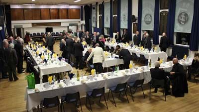 The view from the stage, showing the mammoth task of setting the tables.